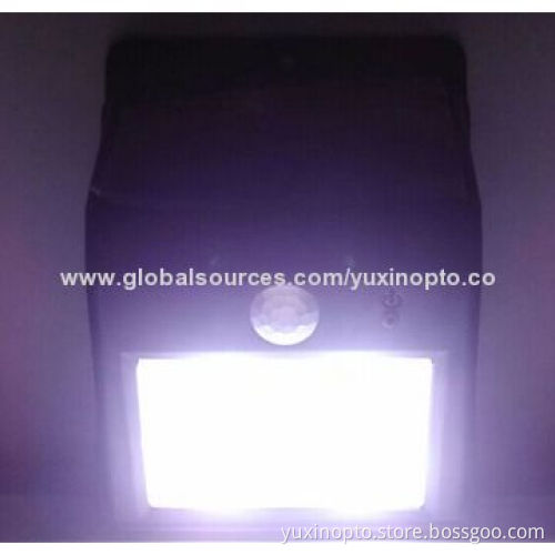 Light sensor LED solar yard lamp